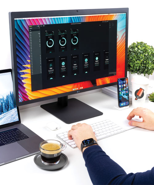 Zone Graphix designer working at a creative workstation